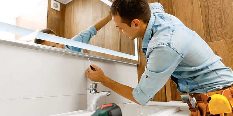 how to hang a bathroom mirror featured image