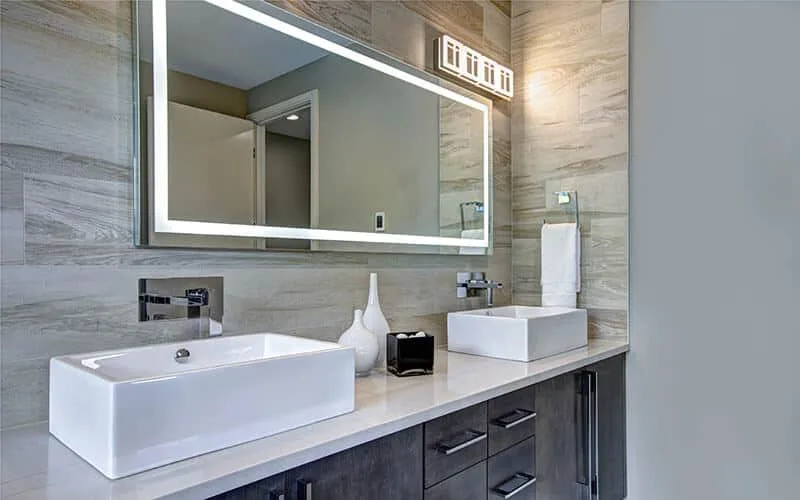 LED lighted mirror in bathroom